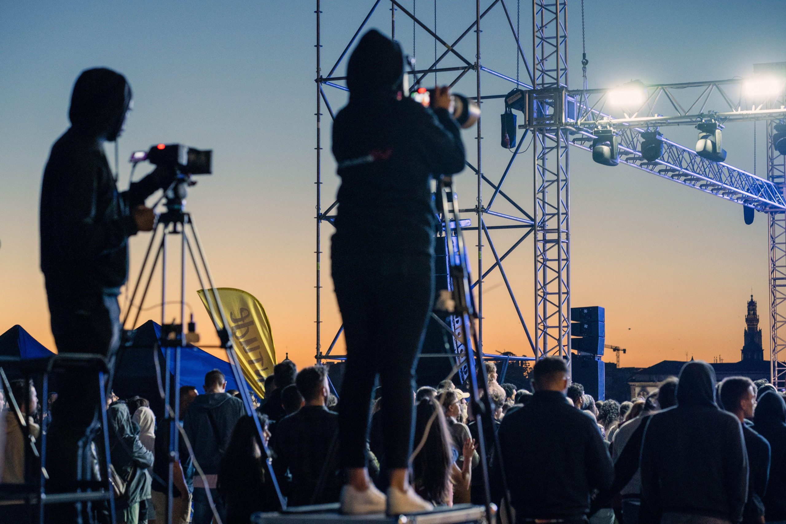 Cameramen Capturing Moments at a Live Event